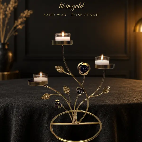 Candles glowing in a gold rose stand
