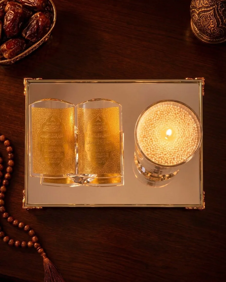 The Mirror Tray gift set seen from above: the open book and the candle on the mirror tray